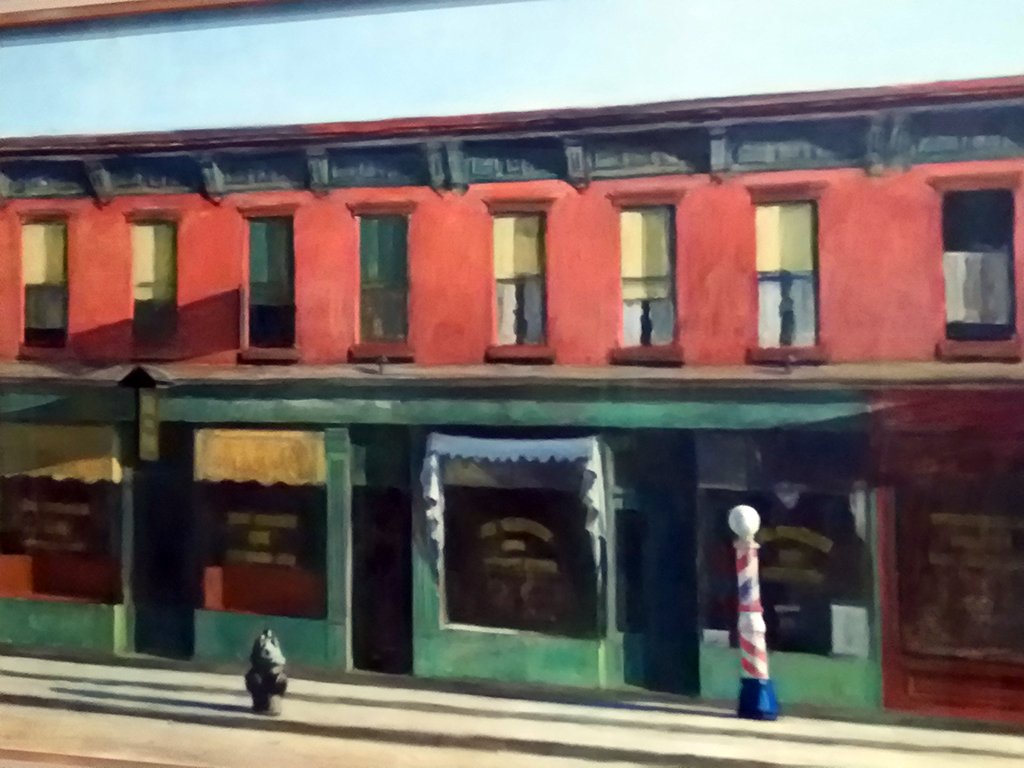 Fotografía del cuadro de Edward Hopper: "Domingo por la mañana" (1930) inspirado en una calle real de la avenida 7 del Greenwich Village reducida a su mínima expresión - Foto de AHM