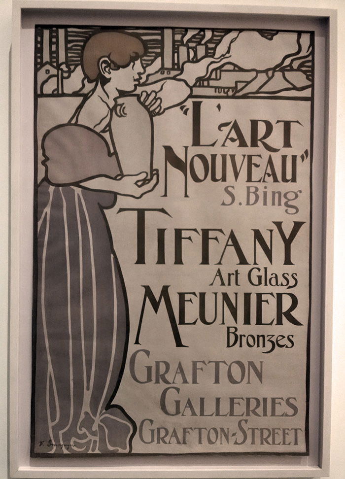 Cartel antiguo de la Neustadt Collection of Tiffany Glass expuesto en el Museo de Queens - Foto de AHM